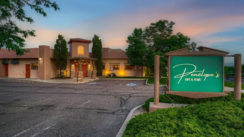 Elegant Spanish-inspired exterior of Penelope's Café & Venue in Westminster, Colorado